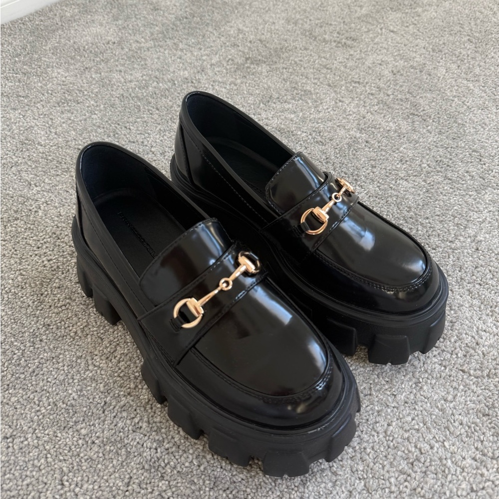 Princess Polly Black and Gold Platform Loafers